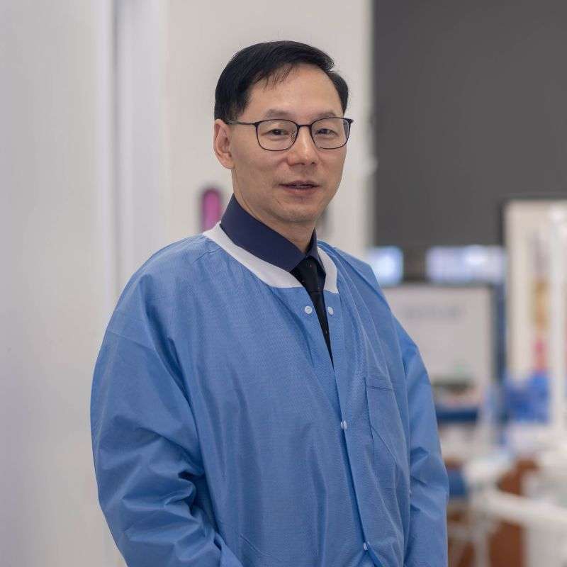 Dr. Shi - lead implant specialist at Centre Dental Manhattan specializing in CBCT-guided full-arch surgery